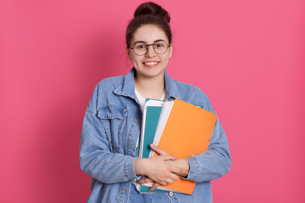 Female Student Practicing Math