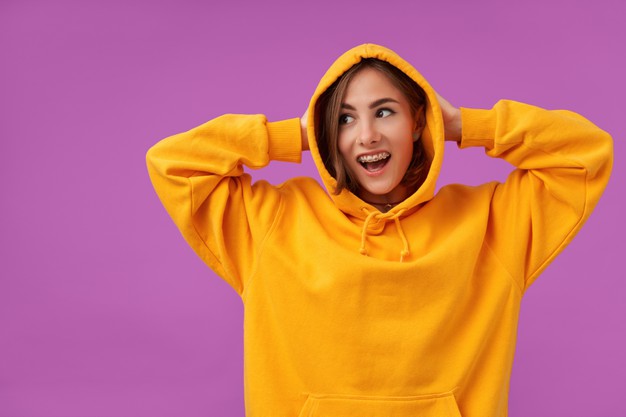 Girl Wearing Orange Hoodie