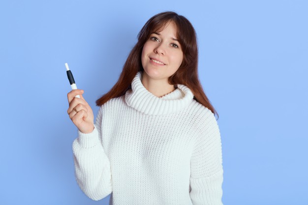 Woman smoking e-cigarettes